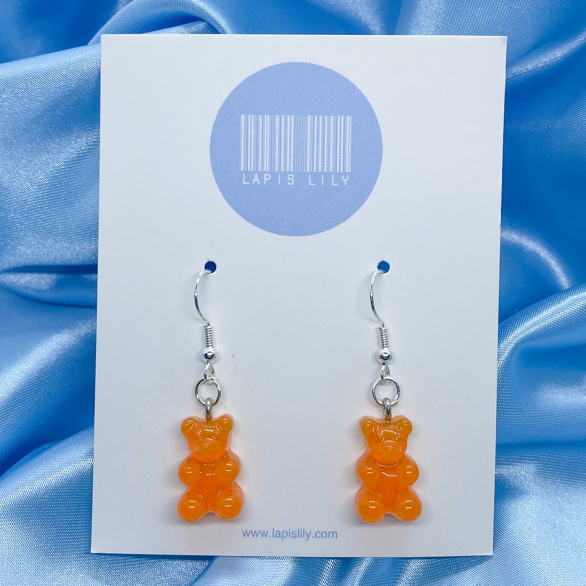 Resin orange gummy bear earrings with stainless steel earring hooks, clip ons, or s925 sterling silver earring hooks